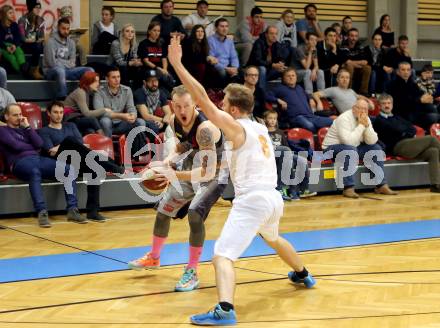 Basketball 2.Bundesliga 2014/15 Grunddurchgang 10.Runde. Woerthersee Piraten gegen Villach Raiders. Sebastian Huber,  (Piraten), Nino Gross (Villach). Klagenfurt, 29.11.2014.
Foto: Kuess
---
pressefotos, pressefotografie, kuess, qs, qspictures, sport, bild, bilder, bilddatenbank