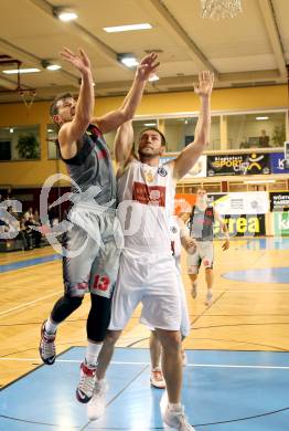 Basketball 2.Bundesliga 2014/15 Grunddurchgang 10.Runde. Woerthersee Piraten gegen Villach Raiders. Maximilian Kunovjanek, (Piraten), Andreas Napokoj  (Villach). Klagenfurt, 29.11.2014.
Foto: Kuess
---
pressefotos, pressefotografie, kuess, qs, qspictures, sport, bild, bilder, bilddatenbank