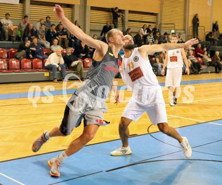 Basketball 2.Bundesliga 2014/15 Grunddurchgang 10.Runde. Woerthersee Piraten gegen Villach Raiders. Joachim Buggelsheim, (Piraten), Gaidys Povilas  (Villach). Klagenfurt, 29.11.2014.
Foto: Kuess
---
pressefotos, pressefotografie, kuess, qs, qspictures, sport, bild, bilder, bilddatenbank