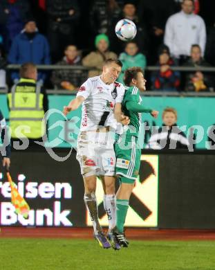 Fussball Bundesliga. RZ Pellets WAC gegen SK Rapid Wien. Daniel Drescher,  (WAC), Louis Schaub (Rapid). Klagenfiurt, am 8.11.2014.
Foto: Kuess

---
pressefotos, pressefotografie, kuess, qs, qspictures, sport, bild, bilder, bilddatenbank