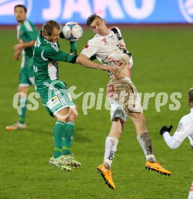 Fussball Bundesliga. RZ Pellets WAC gegen SK Rapid Wien. Tadej Trdina,  (WAC), Mario Sonnleitner (Rapid). Wolfsberg, am 7.11.2014.
Foto: Kuess

---
pressefotos, pressefotografie, kuess, qs, qspictures, sport, bild, bilder, bilddatenbank