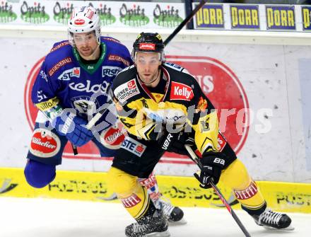 EBEL. Eishockey Bundesliga. EC VSV gegen UPC Vienna Capitals. Eric HUnter,  (VSV), Peter MacArthur (Caps). Villach, am 12.12.2014.
Foto: Kuess 


---
pressefotos, pressefotografie, kuess, qs, qspictures, sport, bild, bilder, bilddatenbank