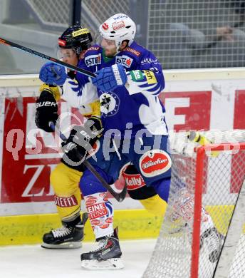 EBEL. Eishockey Bundesliga. EC VSV gegen UPC Vienna Capitals.  Benjamin Petrik,  (VSV), Florian Iberer (Caps). Villach, am 12.12.2014.
Foto: Kuess 


---
pressefotos, pressefotografie, kuess, qs, qspictures, sport, bild, bilder, bilddatenbank