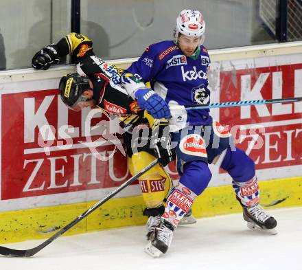 EBEL. Eishockey Bundesliga. EC VSV gegen UPC Vienna Capitals. Eric Hunter,  (VSV), Rafael Rotter (Caps). Villach, am 12.12.2014.
Foto: Kuess 


---
pressefotos, pressefotografie, kuess, qs, qspictures, sport, bild, bilder, bilddatenbank