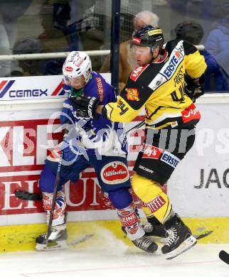 EBEL. Eishockey Bundesliga. EC VSV gegen UPC Vienna Capitals. Marco Pewal, (VSV), Jamie Fraser (Caps). Villach, am 12.12.2014.
Foto: Kuess 


---
pressefotos, pressefotografie, kuess, qs, qspictures, sport, bild, bilder, bilddatenbank