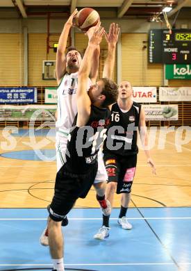 Basketball 2.Bundesliga 2014/15 Grunddurchgang 12.Runde. KOS Celovec gegen Mattersburg Rocks. Rok Papic,  (KOS), Sebastian Gmeiner (Mattersburg Rocks). Klagenfurt, 13.12.2014.
Foto: Kuess
---
pressefotos, pressefotografie, kuess, qs, qspictures, sport, bild, bilder, bilddatenbank