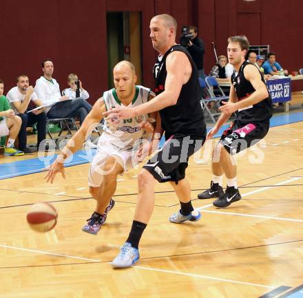 Basketball 2.Bundesliga 2014/15 Grunddurchgang 12.Runde. KOS Celovec gegen Mattersburg Rocks. Davor Sattler,  (KOS), Corey Hallett (Mattersburg Rocks). Klagenfurt, 13.12.2014.
Foto: Kuess
---
pressefotos, pressefotografie, kuess, qs, qspictures, sport, bild, bilder, bilddatenbank