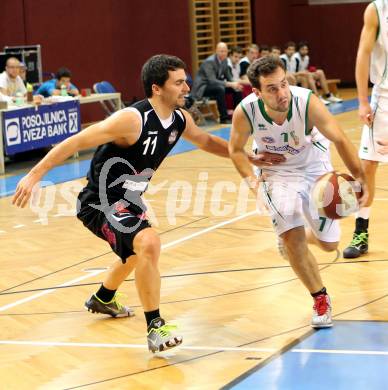 Basketball 2.Bundesliga 2014/15 Grunddurchgang 12.Runde. KOS Celovec gegen Mattersburg Rocks. Rok Papic,  (KOS), Stefan Ulreich (Mattersburg Rocks). Klagenfurt, 13.12.2014.
Foto: Kuess
---
pressefotos, pressefotografie, kuess, qs, qspictures, sport, bild, bilder, bilddatenbank