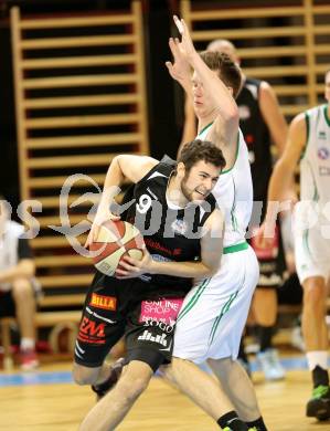 Basketball 2.Bundesliga 2014/15 Grunddurchgang 12.Runde. KOS Celovec gegen Mattersburg Rocks. Toman Feinig,  (KOS), Tobias Winkler (Mattersburg Rocks). Klagenfurt, 13.12.2014.
Foto: Kuess
---
pressefotos, pressefotografie, kuess, qs, qspictures, sport, bild, bilder, bilddatenbank