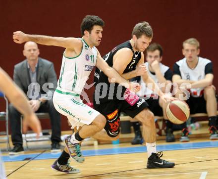 Basketball 2.Bundesliga 2014/15 Grunddurchgang 12.Runde. KOS Celovec gegen Mattersburg Rocks. Tomas Feinig,  (KOS), Sebastian Gmeiner (Mattersburg Rocks). Klagenfurt, 13.12.2014.
Foto: Kuess
---
pressefotos, pressefotografie, kuess, qs, qspictures, sport, bild, bilder, bilddatenbank