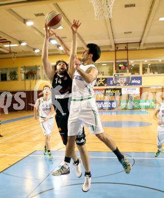 Basketball 2.Bundesliga 2014/15 Grunddurchgang 12.Runde. KOS Celovec gegen Mattersburg Rocks. Toman Feinig,  (KOS), Michael Mach (Mattersburg Rocks). Klagenfurt, 13.12.2014.
Foto: Kuess
---
pressefotos, pressefotografie, kuess, qs, qspictures, sport, bild, bilder, bilddatenbank