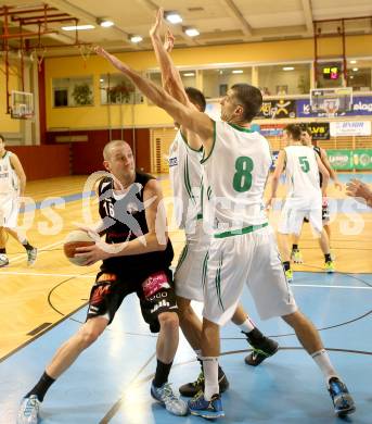 Basketball 2.Bundesliga 2014/15 Grunddurchgang 12.Runde. KOS Celovec gegen Mattersburg Rocks. Ales Primc, (KOS), Corey Hallett  (Mattersburg Rocks). Klagenfurt, 13.12.2014.
Foto: Kuess
---
pressefotos, pressefotografie, kuess, qs, qspictures, sport, bild, bilder, bilddatenbank