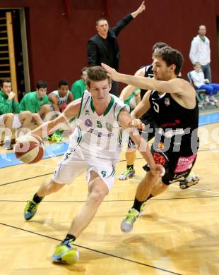 Basketball 2.Bundesliga 2014/15 Grunddurchgang 12.Runde. KOS Celovec gegen Mattersburg Rocks. Andi Smrtnik,  (KOS), Jan Nicoli (Mattersburg Rocks). Klagenfurt, 13.12.2014.
Foto: Kuess
---
pressefotos, pressefotografie, kuess, qs, qspictures, sport, bild, bilder, bilddatenbank