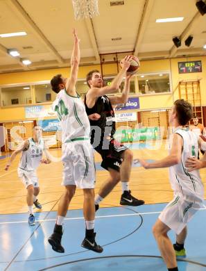 Basketball 2.Bundesliga 2014/15 Grunddurchgang 12.Runde. KOS Celovec gegen Mattersburg Rocks. Ales Kunc,  (KOS), Sebastian Gmeiner (Mattersburg Rocks). Klagenfurt, 13.12.2014.
Foto: Kuess
---
pressefotos, pressefotografie, kuess, qs, qspictures, sport, bild, bilder, bilddatenbank