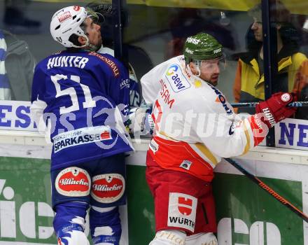 EBEL. Eishockey Bundesliga. EC VSV gegen HCB SUEDTIROL. Eric HUnter,  (VSV), Marco Insam (Bozen). Villach, am 14.12.2014.
Foto: Kuess 


---
pressefotos, pressefotografie, kuess, qs, qspictures, sport, bild, bilder, bilddatenbank