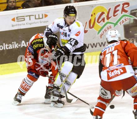 EBEL. Eishockey Bundesliga. KAC gegen Dornbirner Eishockey Club. Johannes Reichel,  (KAC),  Smail Samardzic (Dornbirn). Klagenfurt, am 14.12.2014.
Foto: Kuess 

---
pressefotos, pressefotografie, kuess, qs, qspictures, sport, bild, bilder, bilddatenbank