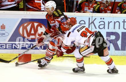 EBEL. Eishockey Bundesliga. KAC gegen HC TWK Innsbruck. Mike Siklenka,  (KAC), Marcus Olsson (Innsbruck). Klagenfurt, am 19.12.2014.
Foto: Kuess 

---
pressefotos, pressefotografie, kuess, qs, qspictures, sport, bild, bilder, bilddatenbank