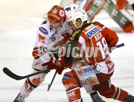 EBEL. Eishockey Bundesliga. KAC gegen HC TWK Innsbruck. Thomas Koch,  (KAC), Jeff Ulmer (Innsbruck). Klagenfurt, am 19.12.2014.
Foto: Kuess 

---
pressefotos, pressefotografie, kuess, qs, qspictures, sport, bild, bilder, bilddatenbank