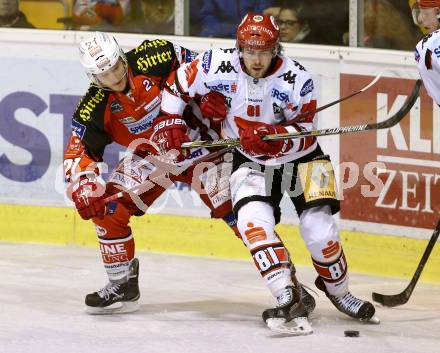 EBEL. Eishockey Bundesliga. KAC gegen HC TWK Innsbruck. Manuel Geier,  (KAC), Nicholas Ross (Innsbruck). Klagenfurt, am 19.12.2014.
Foto: Kuess 

---
pressefotos, pressefotografie, kuess, qs, qspictures, sport, bild, bilder, bilddatenbank