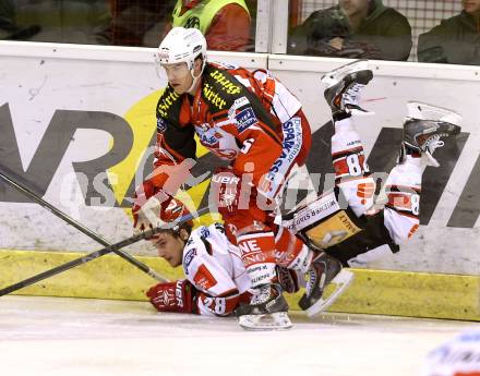 EBEL. Eishockey Bundesliga. KAC gegen HC TWK Innsbruck. Jason Desantis,  (KAC), Fabio Schramm (Innsbruck). Klagenfurt, am 19.12.2014.
Foto: Kuess 

---
pressefotos, pressefotografie, kuess, qs, qspictures, sport, bild, bilder, bilddatenbank