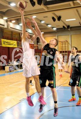 Basketball 2.Bundesliga 2014/15 Grunddurchgang 13.Runde. Woerthersee Piraten gegen Basket Flames. Christoph Gspandl,  (Piraten), Paul Koroschitz (Basket Flames). Klagenfurt, 20.12.2014.
Foto: Kuess
---
pressefotos, pressefotografie, kuess, qs, qspictures, sport, bild, bilder, bilddatenbank