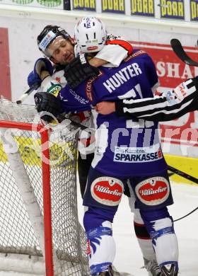 EBEL. Eishockey Bundesliga. EC VSV gegen HC Orli Znojmo. Rauferei Eric Hunter,  (VSV), Maris Jass (Znojmo). Villach, am 23.12.2014.
Foto: Kuess 


---
pressefotos, pressefotografie, kuess, qs, qspictures, sport, bild, bilder, bilddatenbank