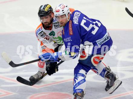 EBEL. Eishockey Bundesliga. EC VSV gegen Moser Medical Graz 99ers.  Eric Hunter, (VSV),  Stephen Werner (Graz 99ers). Villach, am 28.12.2014.
Foto: Kuess 


---
pressefotos, pressefotografie, kuess, qs, qspictures, sport, bild, bilder, bilddatenbank