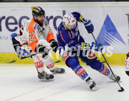 EBEL. Eishockey Bundesliga. EC VSV gegen Moser Medical Graz 99ers.  Benjamin Petrik, (VSV), Stephen Werner  (Graz 99ers). Villach, am 28.12.2014.
Foto: Kuess 


---
pressefotos, pressefotografie, kuess, qs, qspictures, sport, bild, bilder, bilddatenbank