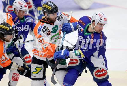 EBEL. Eishockey Bundesliga. EC VSV gegen Moser Medical Graz 99ers.  Eric HUnter,  (VSV), Stephen Werner (Graz 99ers). Villach, am 28.12.2014.
Foto: Kuess 


---
pressefotos, pressefotografie, kuess, qs, qspictures, sport, bild, bilder, bilddatenbank