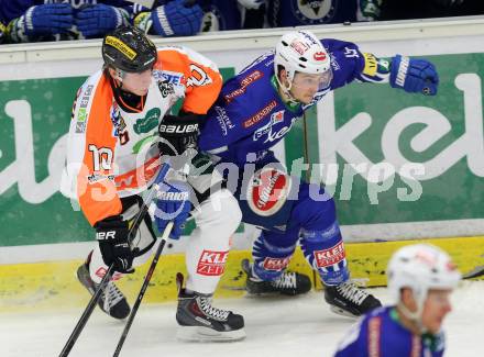 EBEL. Eishockey Bundesliga. EC VSV gegen Moser Medical Graz 99ers.  Stefan Bacher,  (VSV), Zintis Nauris Zusevics (Graz 99ers). Villach, am 28.12.2014.
Foto: Kuess 


---
pressefotos, pressefotografie, kuess, qs, qspictures, sport, bild, bilder, bilddatenbank