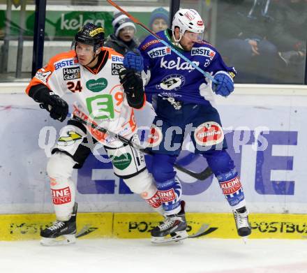 EBEL. Eishockey Bundesliga. EC VSV gegen Moser Medical Graz 99ers.  Benjamin Petrik,  (VSV), Kristof Reinthaler (Graz 99ers). Villach, am 28.12.2014.
Foto: Kuess 


---
pressefotos, pressefotografie, kuess, qs, qspictures, sport, bild, bilder, bilddatenbank