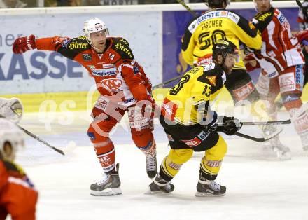 EBEL. Eishockey Bundesliga. KAC gegen UPC Vienna Capitals. Jamie Lundmark,  (KAC), Michael Schiechl (Caps). Klagenfurt, am 30.12.2014.
Foto: Kuess 

---
pressefotos, pressefotografie, kuess, qs, qspictures, sport, bild, bilder, bilddatenbank