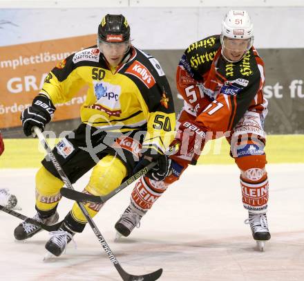 EBEL. Eishockey Bundesliga. KAC gegen UPC Vienna Capitals. Oliver Setzinger,  (KAC), Mario Fischer (Caps). Klagenfurt, am 30.12.2014.
Foto: Kuess 

---
pressefotos, pressefotografie, kuess, qs, qspictures, sport, bild, bilder, bilddatenbank