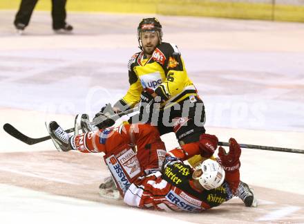 EBEL. Eishockey Bundesliga. KAC gegen UPC Vienna Capitals. Jamie Lundmark,  (KAC), Rafael Rotter (Caps). Klagenfurt, am 30.12.2014.
Foto: Kuess 

---
pressefotos, pressefotografie, kuess, qs, qspictures, sport, bild, bilder, bilddatenbank