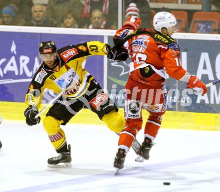 EBEL. Eishockey Bundesliga. KAC gegen UPC Vienna Capitals. Patrick Harand,  (KAC), Matt Watkins (Caps). Klagenfurt, am 30.12.2014.
Foto: Kuess 

---
pressefotos, pressefotografie, kuess, qs, qspictures, sport, bild, bilder, bilddatenbank