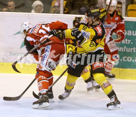 EBEL. Eishockey Bundesliga. KAC gegen UPC Vienna Capitals. Patrick Harand,  (KAC), Mario Fischer (Caps). Klagenfurt, am 30.12.2014.
Foto: Kuess 

---
pressefotos, pressefotografie, kuess, qs, qspictures, sport, bild, bilder, bilddatenbank