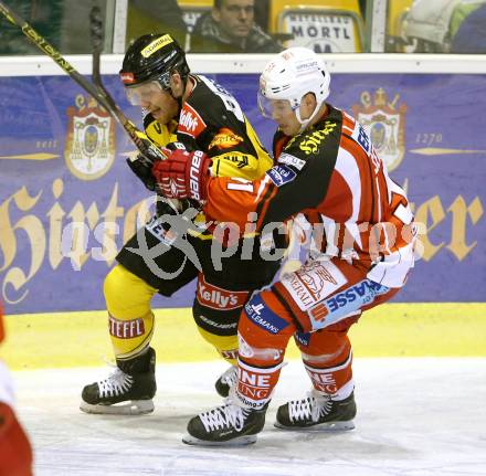 EBEL. Eishockey Bundesliga. KAC gegen UPC Vienna Capitals. Oliver Setzinger, (KAC),  Jamie Fraser  (Caps). Klagenfurt, am 30.12.2014.
Foto: Kuess 

---
pressefotos, pressefotografie, kuess, qs, qspictures, sport, bild, bilder, bilddatenbank