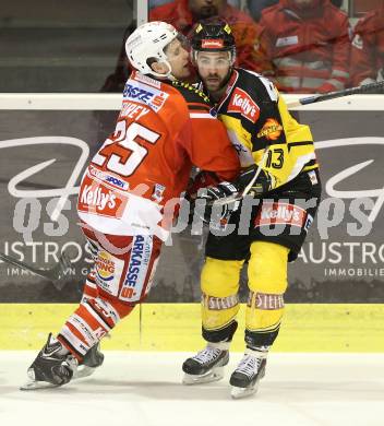 EBEL. Eishockey Bundesliga. KAC gegen UPC Vienna Capitals. Kirk Furey,  (KAC), Michael Schiechl (Caps). Klagenfurt, am 30.12.2014.
Foto: Kuess 

---
pressefotos, pressefotografie, kuess, qs, qspictures, sport, bild, bilder, bilddatenbank