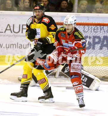 EBEL. Eishockey Bundesliga. KAC gegen UPC Vienna Capitals. Manuel Geier,  (KAC), Philippe Lakos (Caps). Klagenfurt, am 30.12.2014.
Foto: Kuess 

---
pressefotos, pressefotografie, kuess, qs, qspictures, sport, bild, bilder, bilddatenbank