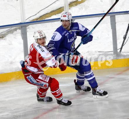 EBEL. Eishockey Bundesliga. Freiluftderby KAC gegen VSV. Manuel Geier, (KAC), Mario Altmann (VSV). Klagenfurt, Woerthersee Stadion, am 3.1.2015.
Foto: Kuess
---
pressefotos, pressefotografie, kuess, qs, qspictures, sport, bild, bilder, bilddatenbank