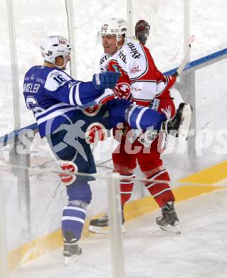 EBEL. Eishockey Bundesliga. Freiluftderby KAC gegen VSV.  Jamie Lundmark,  (KAC), Daniel Nageler (VSV). Klagenfurt, Woerthersee Stadion, am 3.1.2015.
Foto: Kuess
---
pressefotos, pressefotografie, kuess, qs, qspictures, sport, bild, bilder, bilddatenbank