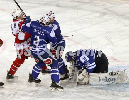 EBEL. Eishockey Bundesliga. Freiluftderby KAC gegen VSV. Thomas HUndertpfund, (KAC),  Cole Jarrett, Gerhard Unterluggauer, Thomas Hoeneckl (VSV). Klagenfurt, Woerthersee Stadion, am 3.1.2015.
Foto: Kuess
---
pressefotos, pressefotografie, kuess, qs, qspictures, sport, bild, bilder, bilddatenbank