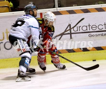 EBEL. Eishockey Bundesliga. KAC gegen EHC LIWEST Linz. Thomas Koch,  (KAC),  Andrew Kozek (Linz). Klagenfurt, am 6.1.2015.
Foto: Kuess 

---
pressefotos, pressefotografie, kuess, qs, qspictures, sport, bild, bilder, bilddatenbank