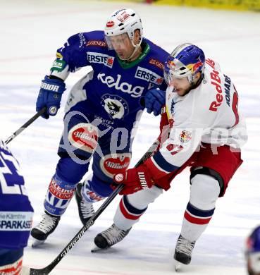 EBEL. Eishockey Bundesliga. EC VSV gegen EC Red Bull Salzburg. Gerhard Unterluggauer,  (VSV), Konstantin Komarek (Salzburg). Villach, am 9.1.2015.
Foto: Kuess 


---
pressefotos, pressefotografie, kuess, qs, qspictures, sport, bild, bilder, bilddatenbank