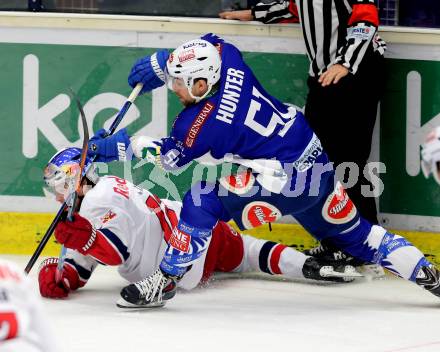 EBEL. Eishockey Bundesliga. EC VSV gegen EC Red Bull Salzburg. Eric HUnter,  (VSV), Alexander Cijan (Salzburg). Villach, am 9.1.2015.
Foto: Kuess 


---
pressefotos, pressefotografie, kuess, qs, qspictures, sport, bild, bilder, bilddatenbank