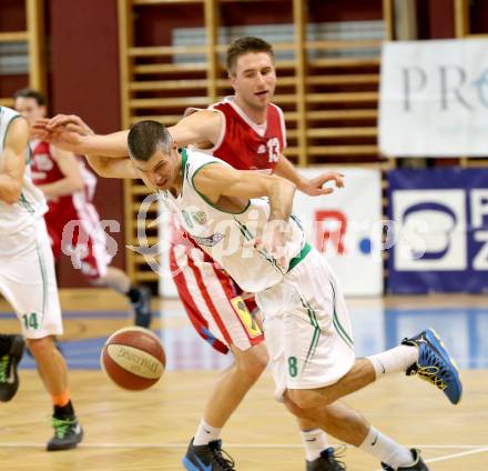 Basketball 2.Bundesliga 2014/15 Grunddurchgang 14.Runde. KOS Celovec gegen Dragons St. Poelten. Ales Primc,  (KOS), Nemanja Nikolic (Dragons). Klagenfurt, 10.1.2015.
Foto: Kuess
---
pressefotos, pressefotografie, kuess, qs, qspictures, sport, bild, bilder, bilddatenbank