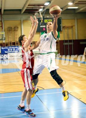 Basketball 2.Bundesliga 2014/15 Grunddurchgang 14.Runde. KOS Celovec gegen Dragons St. Poelten. Jasmin Hercegovac,  (KOS), Paul Radakovics (Dragons). Klagenfurt, 10.1.2015.
Foto: Kuess
---
pressefotos, pressefotografie, kuess, qs, qspictures, sport, bild, bilder, bilddatenbank