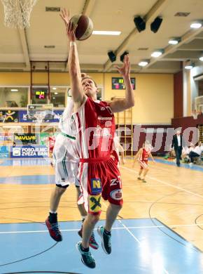 Basketball 2.Bundesliga 2014/15 Grunddurchgang 14.Runde. KOS Celovec gegen Dragons St. Poelten. Fabian Gallob,  (KOS), Andreas Bauch (Dragons). Klagenfurt, 10.1.2015.
Foto: Kuess
---
pressefotos, pressefotografie, kuess, qs, qspictures, sport, bild, bilder, bilddatenbank