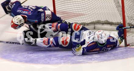 EBEL. Eishockey Bundesliga. EC VSV gegen SAPA Fehervar AV19.  Cole Jarrett,  (VSV), Miklos Rajna (Alba Volan). Villach, am 11.1.2015.
Foto: Kuess 


---
pressefotos, pressefotografie, kuess, qs, qspictures, sport, bild, bilder, bilddatenbank