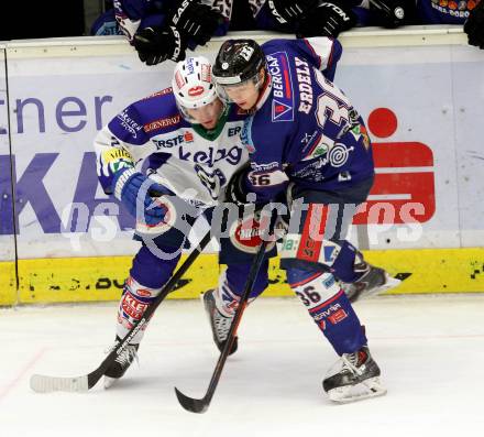 EBEL. Eishockey Bundesliga. EC VSV gegen SAPA Fehervar AV19.  Benjamin Petrik,  (VSV), Csanad Erdely (Alba Volan). Villach, am 11.1.2015.
Foto: Kuess 


---
pressefotos, pressefotografie, kuess, qs, qspictures, sport, bild, bilder, bilddatenbank